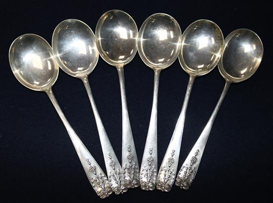A set of six George V silver fancy pattern soup spoons, 9.5 oz.
